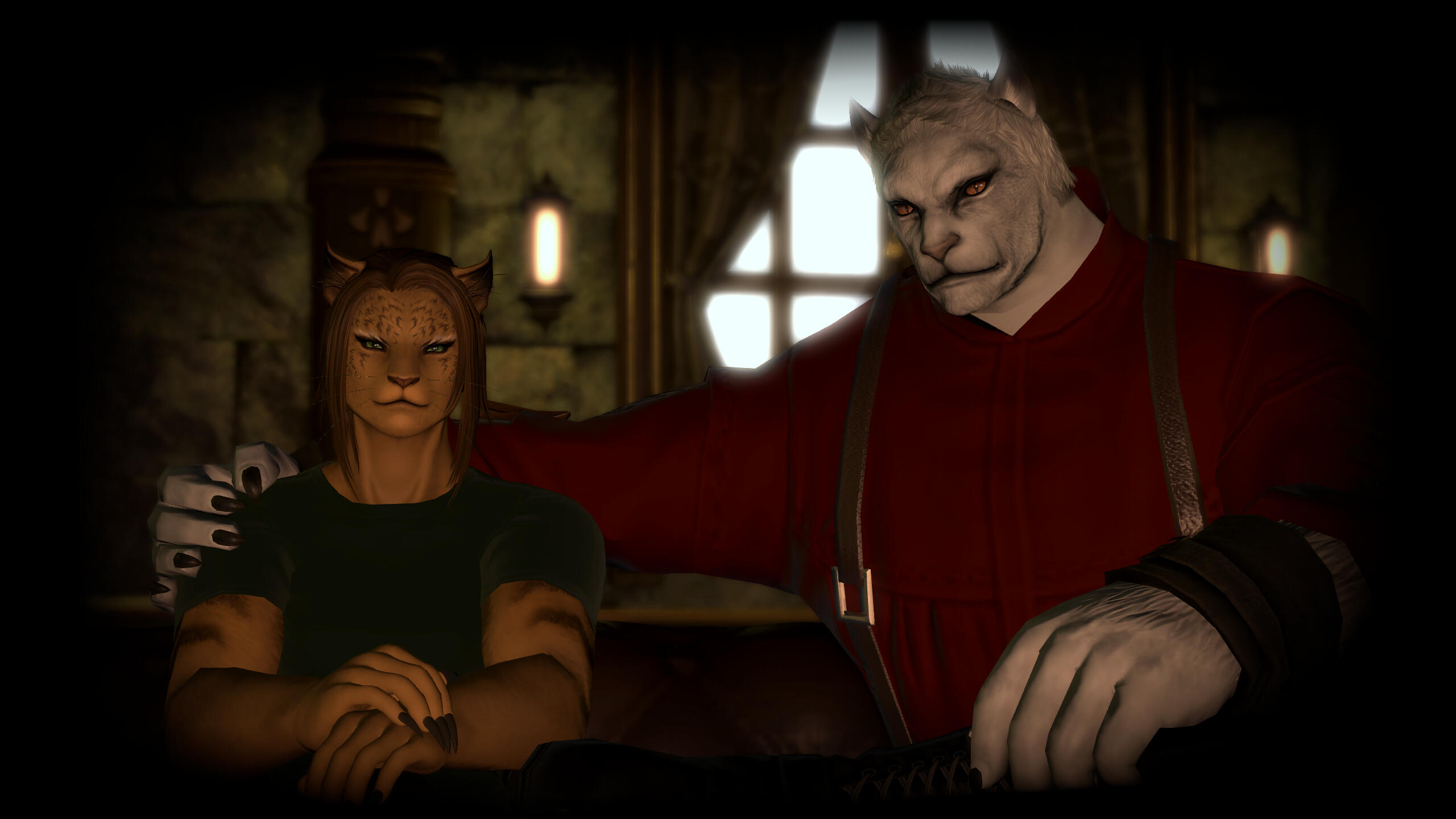 A female hrothgar with sandy-brown fur and darker hair is sitting on a brown couch in a stone room. She is wearing a green t-shirt top. A male hrothgar, taller than her, is sitting next to her. He is older, pale-furred and has his arm around her shoulders.